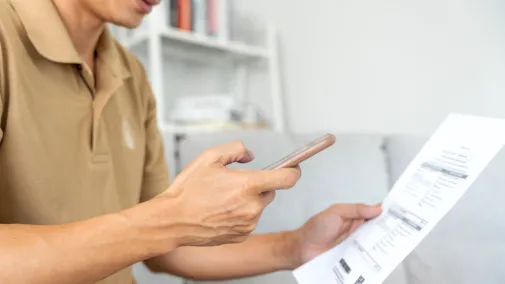 Man scans QR code with ZeSI app