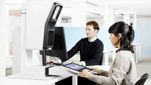 Woman and man uses the PointID recording system