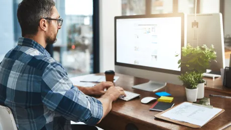 man computer working at home